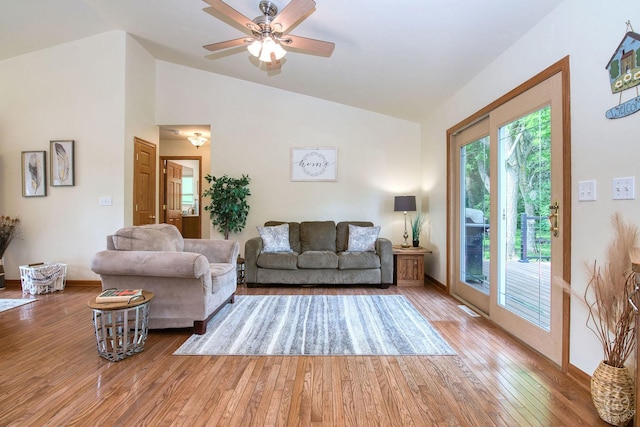 28671 Moose Range Rd, Sycamore, IL 60178 - living area with lofted ceiling, wood-type flooring, a ceiling fan, and baseboards