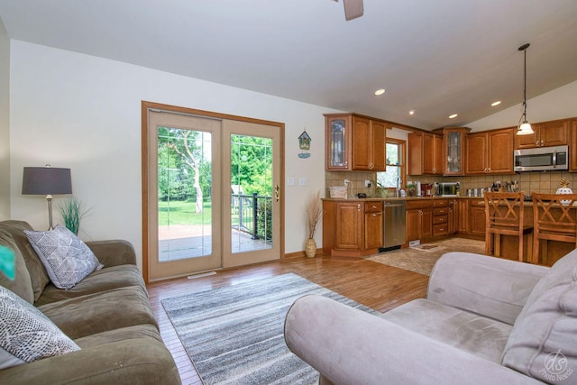 28671 Moose Range Rd, Sycamore, IL 60178 - living room with plenty of natural light, vaulted ceiling, light wood-style flooring, and recessed lighting