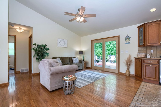 28671 Moose Range Rd, Sycamore, IL 60178 - living area featuring light wood-style floors, plenty of natural light, ceiling fan, and high vaulted ceiling