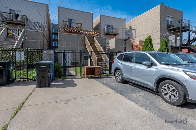 2142 W Madison St Unit 1, Chicago, IL 60612 - exterior space with stairs and uncovered parking