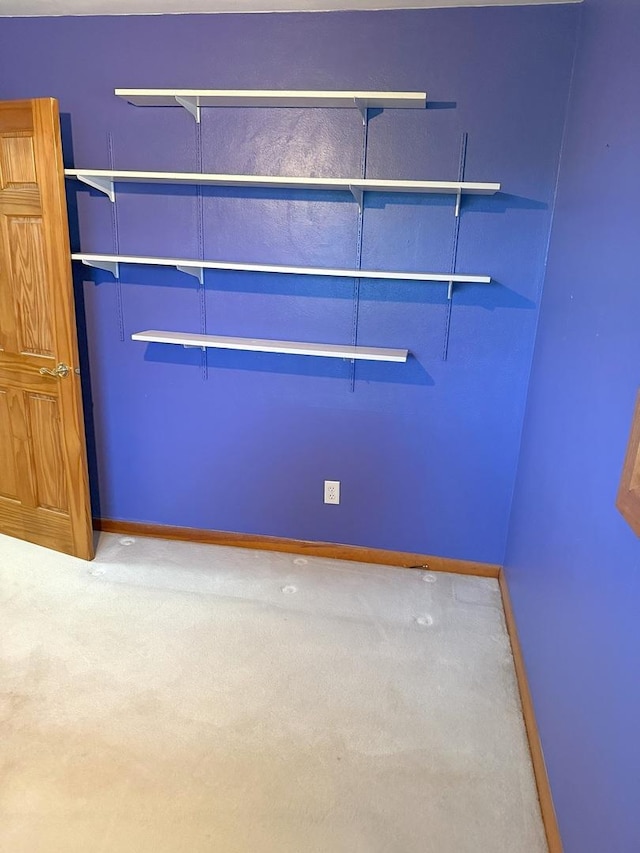 1417 S College Ave, Dixon, IL 61021 - empty room featuring baseboards and carpet flooring