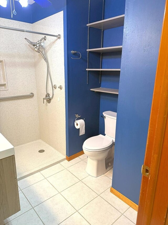 1417 S College Ave, Dixon, IL 61021 - bathroom featuring a shower stall, tile patterned floors, and toilet