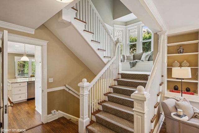 548 Cherry St, Winnetka, IL 60093 - stairs featuring wood finished floors, crown molding, and baseboards