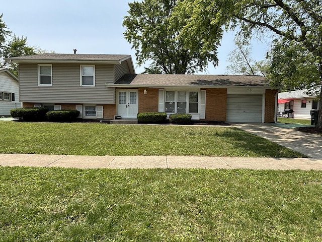 17526 Hawthorne Dr, Country Club Hills, IL 60478 - split level home featuring a garage, brick siding, driveway, a front lawn, and french doors