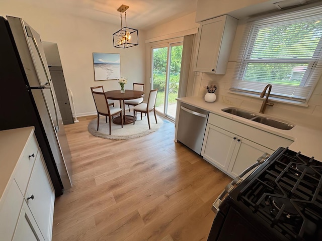 17526 Hawthorne Dr, Country Club Hills, IL 60478 - kitchen featuring appliances with stainless steel finishes, a sink, plenty of natural light, and tasteful backsplash
