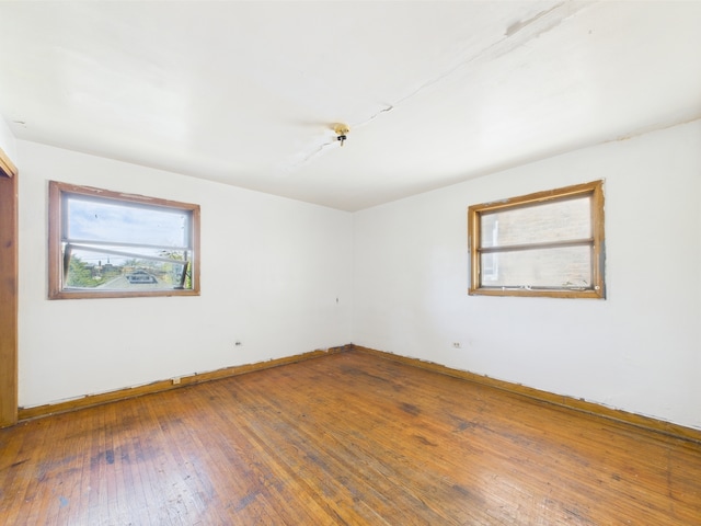 9216 S Ada St, Chicago, IL 60620 - spare room with healthy amount of natural light, baseboards, and hardwood / wood-style flooring