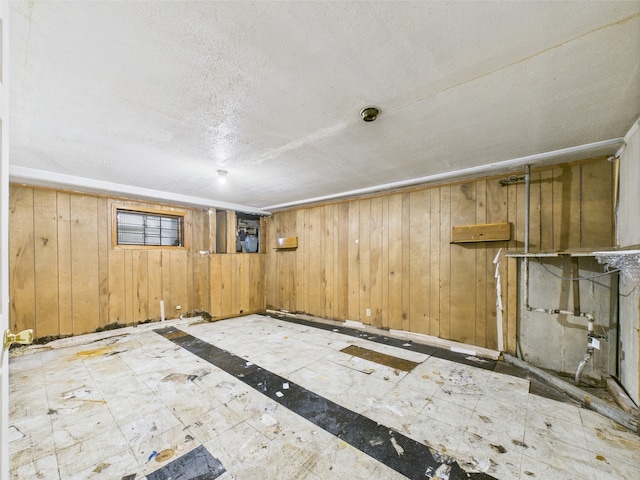 9216 S Ada St, Chicago, IL 60620 - unfurnished room featuring a textured ceiling and wooden walls