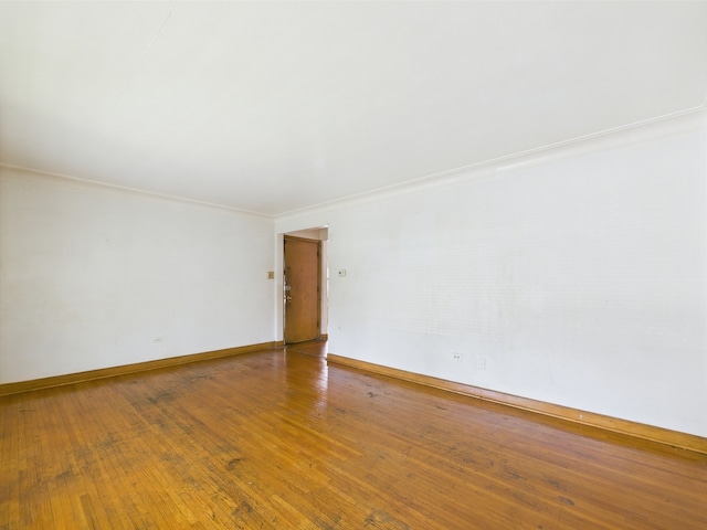 9216 S Ada St, Chicago, IL 60620 - spare room featuring hardwood / wood-style flooring, crown molding, and baseboards