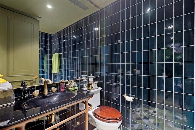 159 E Walton Pl Unit 8C, Chicago, IL 60611 - bathroom with toilet, tile walls, and vanity