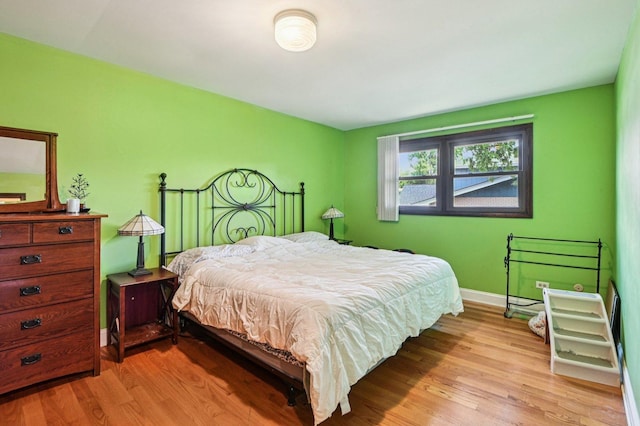 71 Ruggles Ct, Orland Park, IL 60467 - bedroom featuring light wood-style flooring and baseboards