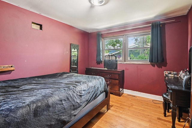 71 Ruggles Ct, Orland Park, IL 60467 - bedroom featuring light wood finished floors and baseboards