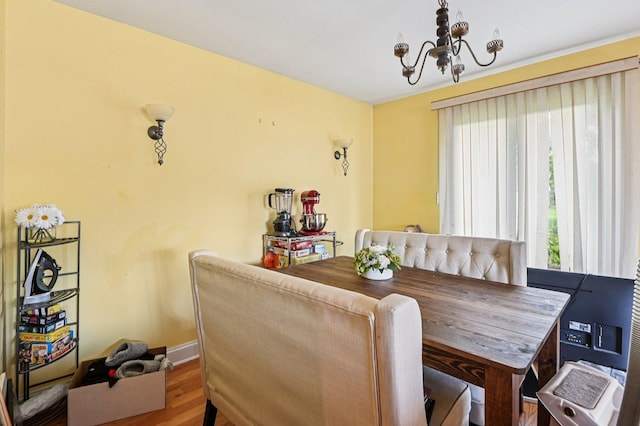 71 Ruggles Ct, Orland Park, IL 60467 - dining space featuring a chandelier and wood finished floors
