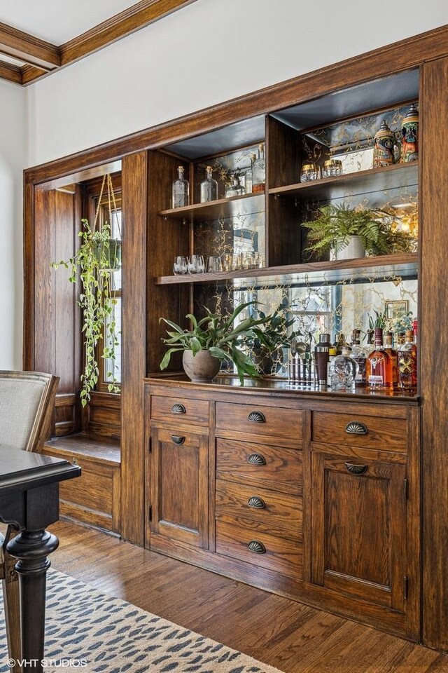 4058 N Kostner Ave, Chicago, IL 60641 - indoor dry bar featuring wood finished floors, crown molding, and beam ceiling