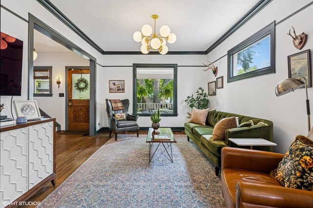 4058 N Kostner Ave, Chicago, IL 60641 - living area with a chandelier, wood finished floors, and crown molding