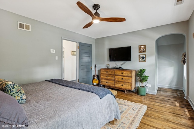 4058 N Kostner Ave, Chicago, IL 60641 - bedroom with wood finished floors, ceiling fan, and baseboards
