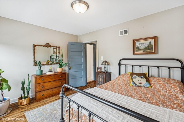 4058 N Kostner Ave, Chicago, IL 60641 - bedroom with wood finished floors and baseboards