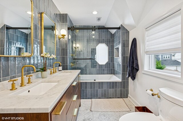 4058 N Kostner Ave, Chicago, IL 60641 - full bathroom with toilet, double vanity, tiled shower / bath combo, baseboards, and recessed lighting