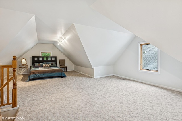 4058 N Kostner Ave, Chicago, IL 60641 - carpeted bedroom featuring vaulted ceiling and baseboards
