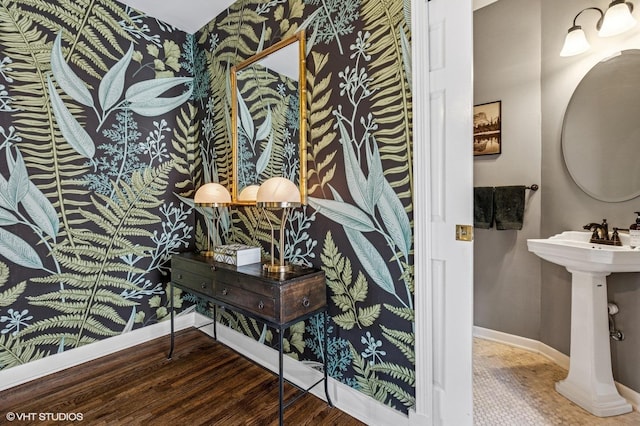 4058 N Kostner Ave, Chicago, IL 60641 - bathroom featuring baseboards, wallpapered walls, and wood finished floors