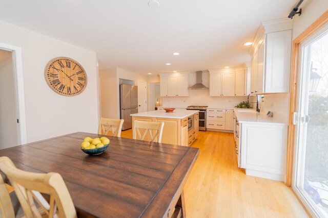 13119 Millbank Dr, Plainfield, IL 60585 - dining room featuring light wood-style floors and recessed lighting