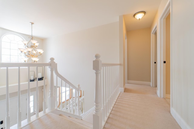 13119 Millbank Dr, Plainfield, IL 60585 - corridor with an upstairs landing, a chandelier, and carpet