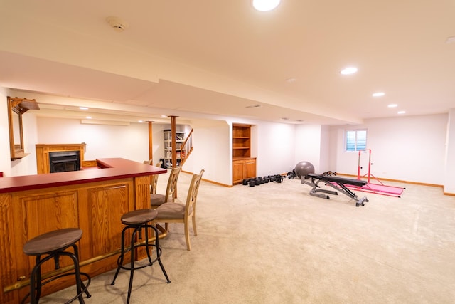 13119 Millbank Dr, Plainfield, IL 60585 - indoor dry bar featuring light colored carpet, baseboards, and recessed lighting