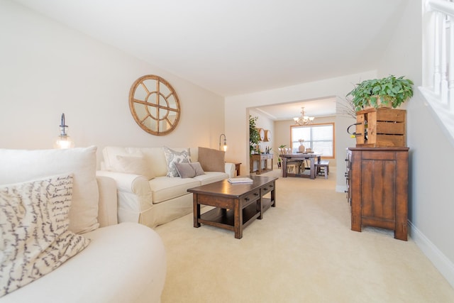 13119 Millbank Dr, Plainfield, IL 60585 - living room with a chandelier, light colored carpet, and baseboards