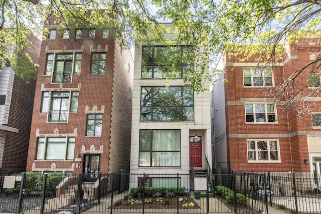 1411 W Huron St Unit 2, Chicago, IL 60642 - view of property featuring a fenced front yard