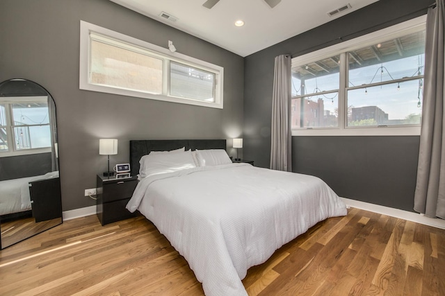 1411 W Huron St Unit 2, Chicago, IL 60642 - bedroom with multiple windows, light wood finished floors, baseboards, and recessed lighting