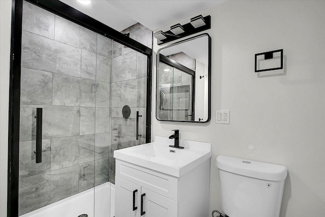 1829 S Kedzie Ave, Chicago, IL 60623 - bathroom featuring toilet, a shower stall, and vanity