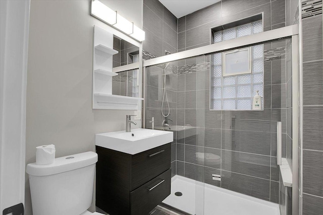 1829 S Kedzie Ave, Chicago, IL 60623 - bathroom featuring toilet, vanity, and a shower stall