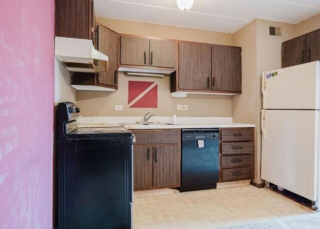 3012 171st St Unit 2E, Hazel Crest, IL 60429 - kitchen featuring stainless steel range with electric stovetop, black dishwasher, freestanding refrigerator, under cabinet range hood, and light countertops