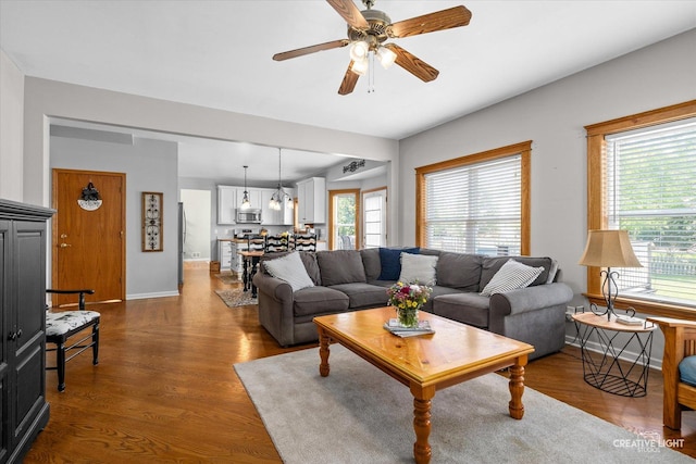 39W382 W Mallory Dr, Geneva, IL 60134 - living area featuring a ceiling fan and wood finished floors