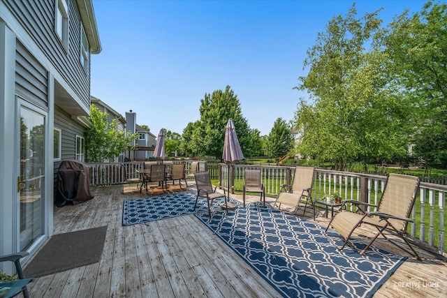 39W382 W Mallory Dr, Geneva, IL 60134 - deck featuring outdoor dining space and a grill