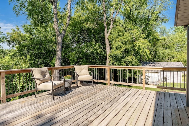 7812 Rhonda Dr, Roscoe, IL 61073 - wooden terrace with view of wooded area