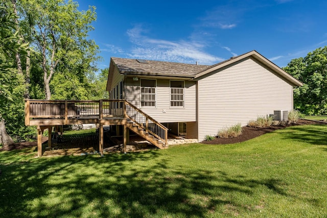 7812 Rhonda Dr, Roscoe, IL 61073 - rear view of property featuring stairs, a wooden deck, a lawn, and a shingled roof