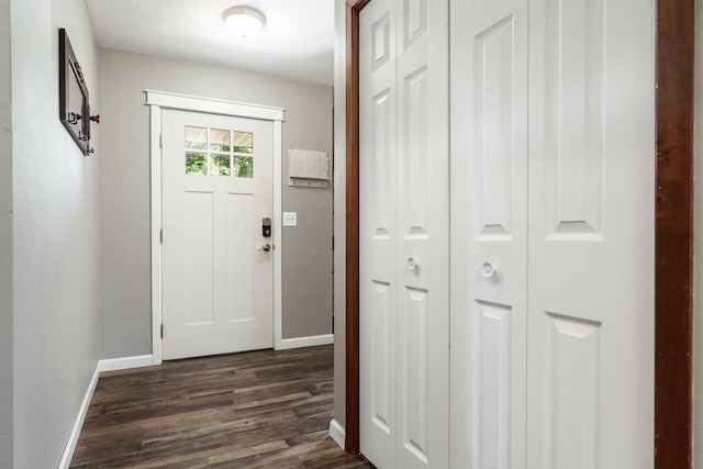 7812 Rhonda Dr, Roscoe, IL 61073 - entryway with baseboards and dark wood-type flooring