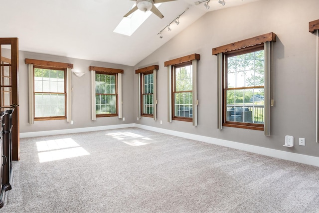 7812 Rhonda Dr, Roscoe, IL 61073 - unfurnished room featuring vaulted ceiling, carpet floors, a ceiling fan, and healthy amount of natural light