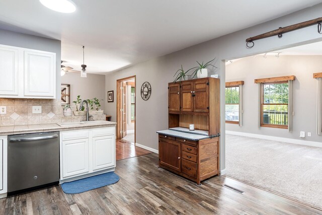 7812 Rhonda Dr, Roscoe, IL 61073 - kitchen with dishwasher, white cabinets, a sink, and ceiling fan