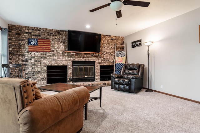 7812 Rhonda Dr, Roscoe, IL 61073 - carpeted living area featuring ceiling fan, a fireplace, and baseboards