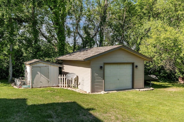 7812 Rhonda Dr, Roscoe, IL 61073 - detached garage with a storage unit