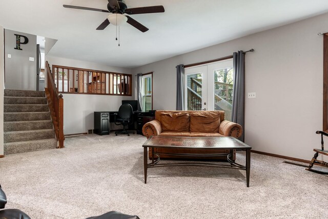 7812 Rhonda Dr, Roscoe, IL 61073 - living area with light carpet, ceiling fan, a desk, and stairway