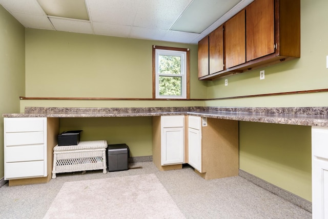 7812 Rhonda Dr, Roscoe, IL 61073 - laundry area with an office area, light carpet, and baseboards