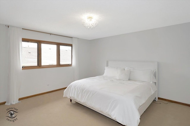 17932 S Alaska Ct Unit 21, Orland Park, IL 60467 - bedroom with light carpet and baseboards