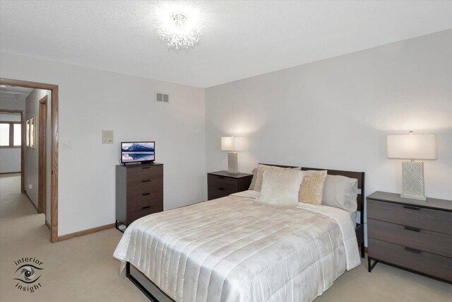 17932 S Alaska Ct Unit 21, Orland Park, IL 60467 - bedroom featuring light colored carpet and baseboards