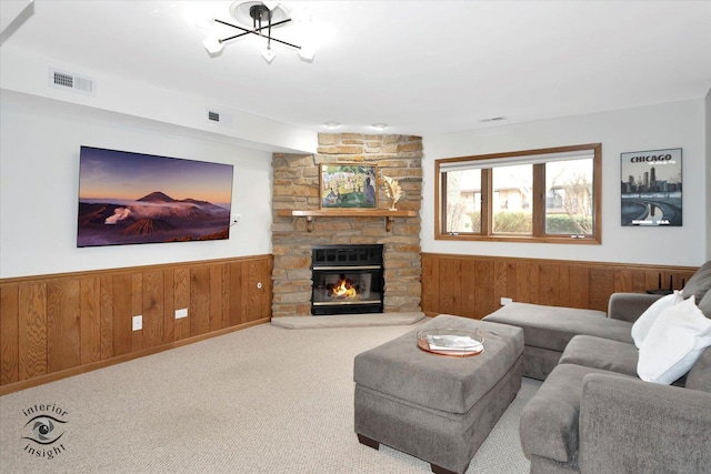 17932 S Alaska Ct Unit 21, Orland Park, IL 60467 - carpeted living room featuring a wainscoted wall, wood walls, and a fireplace