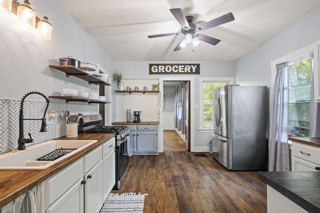 13805 Sharp Dr, Plainfield, IL 60544 - kitchen with appliances with stainless steel finishes, a sink, open shelves, butcher block counters, and ceiling fan