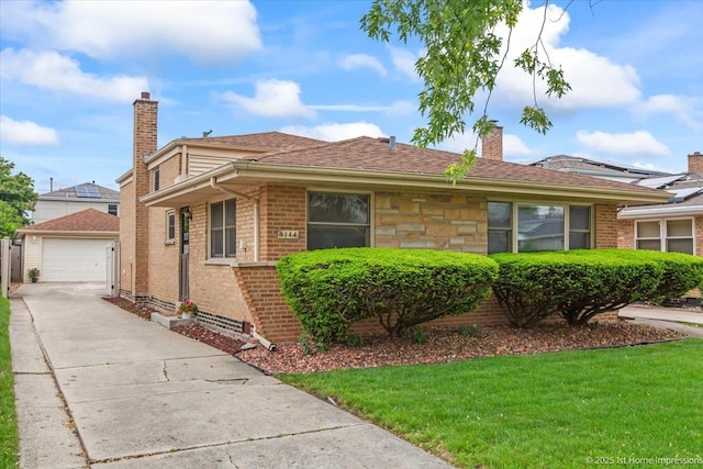 9144 S Trumbull Ave, Evergreen Park, IL 60805 - view of front of house featuring a chimney, brick siding, an outdoor structure, a detached garage, and a front lawn