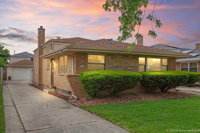 9144 S Trumbull Ave, Evergreen Park, IL 60805 - view of front of property with a chimney, brick siding, an outdoor structure, a garage, and a front yard