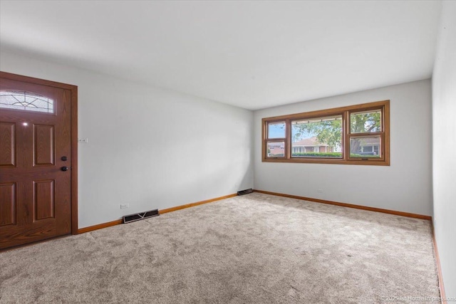 9144 S Trumbull Ave, Evergreen Park, IL 60805 - entrance foyer with carpet and baseboards